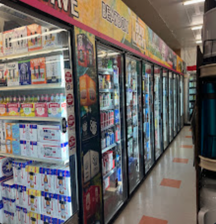 Row of glass-door beverage coolers stocked with cold drinks